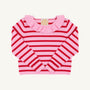 A long-sleeve girls’ sweater by The Beaufort Bonnet Company, the Reece Ruffle Sweater in Pier Party Pink & Richmond Red Stripe, featuring pink and red horizontal stripes and a ruffled pink collar, is displayed laid flat on a white background.