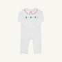 The Samuel Smocked Romper - Worth Avenue White & Richmond Red with Trees is a white long-sleeved Pima cotton romper with a red-trimmed collar and a smocked chest panel featuring green Christmas trees and red dots.