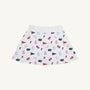 The Beaufort Bonnet Company’s Florida Searcy Skort – Florida Forever with Worth Avenue White features a soft Pima Cotton Knit fabric and a comfortable elastic waistband. The skort showcases a vibrant pattern of colorful University of Florida motifs—including pennants, F logos, cheer megaphones, and gator mascots—set against a crisp white background in the signature Florida Forever print.