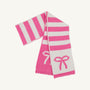 The Beaufort Bonnet Company’s Seller’s Scarf in Hamptons Hot Pink & Palmetto Pearl Stripe with Bows features alternating pink and white stripes adorned with delicate bow designs and scalloped edges. This cotton knit scarf is a cozy and stylish accessory, perfect for girls to wear on chilly days.