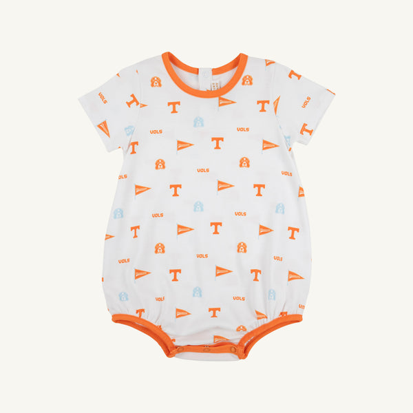 Sure! Here’s the rewritten sentence using the provided product data: Dress your little fan in The Beaufort Bonnet Company’s Tennessee Short Sleeve Patton Play Bubble - Victory in Orange with Tennessee Orange, beautifully crafted from soft Pima Cotton Knit. This white romper features vibrant orange trim and is adorned with orange and blue University of Tennessee symbols—including logos, flags, and mascots—on a plain background, making it the perfect game day outfit.