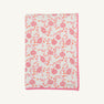 The Silent Night Throw - Gourd-geous (Palmetto Pearl) with Romany Rose by The Beaufort Bonnet Company features a cozy white design with a pink border, adorned with charming pink and orange pomegranates and vines, reminiscent of the comforting warmth of a waffle knit throw.