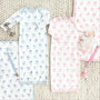 Two baby gowns in Blue Grand Gasparilla Gingham featuring carriage prints, paired with matching blankets, a doll, and two Parker Paci Clip - Blue Grand Gasparilla Gingham with Buckhead Blue sets.