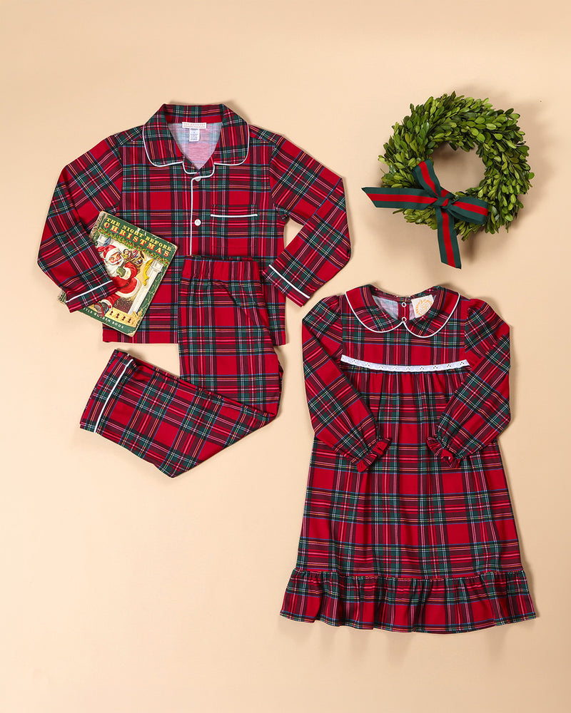 A Goldie Locks Nightgown - Society Prep Plaid with Worth Avenue White, accompanied by a small copy of The Night Before Christmas and a decorative boxwood wreath.