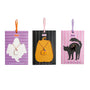 Three Halloween Charm Necklace - More Options gold-tone necklaces displayed on Halloween-themed cards featuring a ghost, a pumpkin, and a feline.