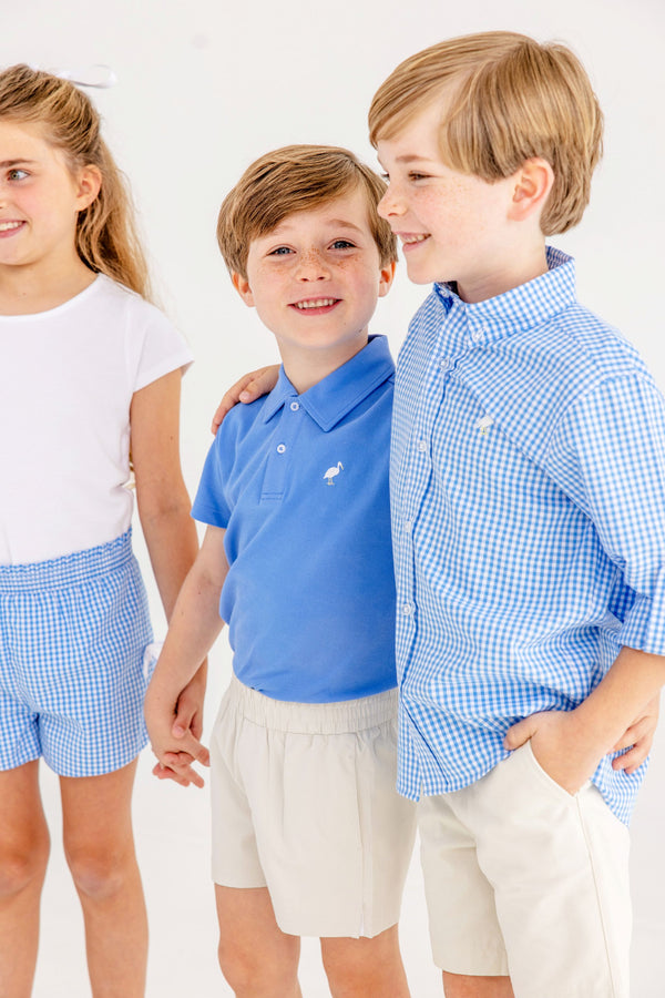 Prim & Proper Beach Polo & Onesie - Sunrise Blvd. Blue with Multicolor Stork