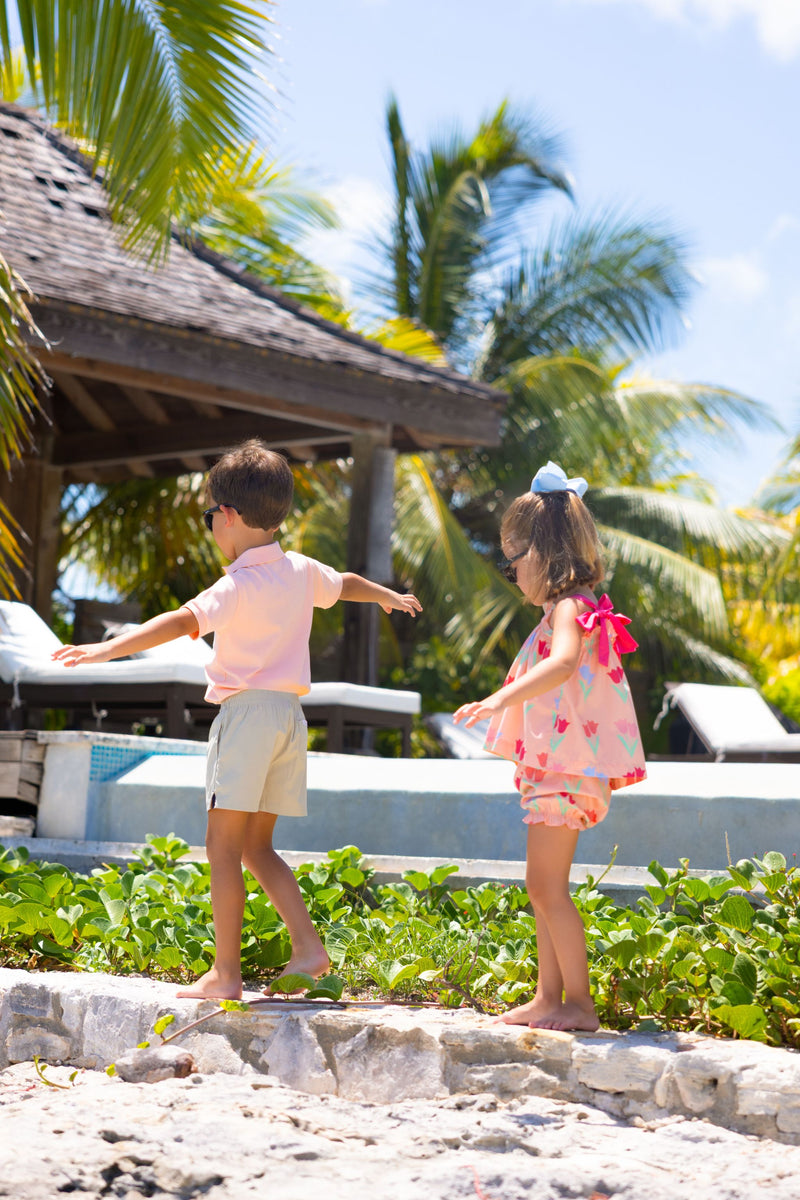 Prim & Proper Polo & Onesie - Pompano Peach with Multicolor Stork