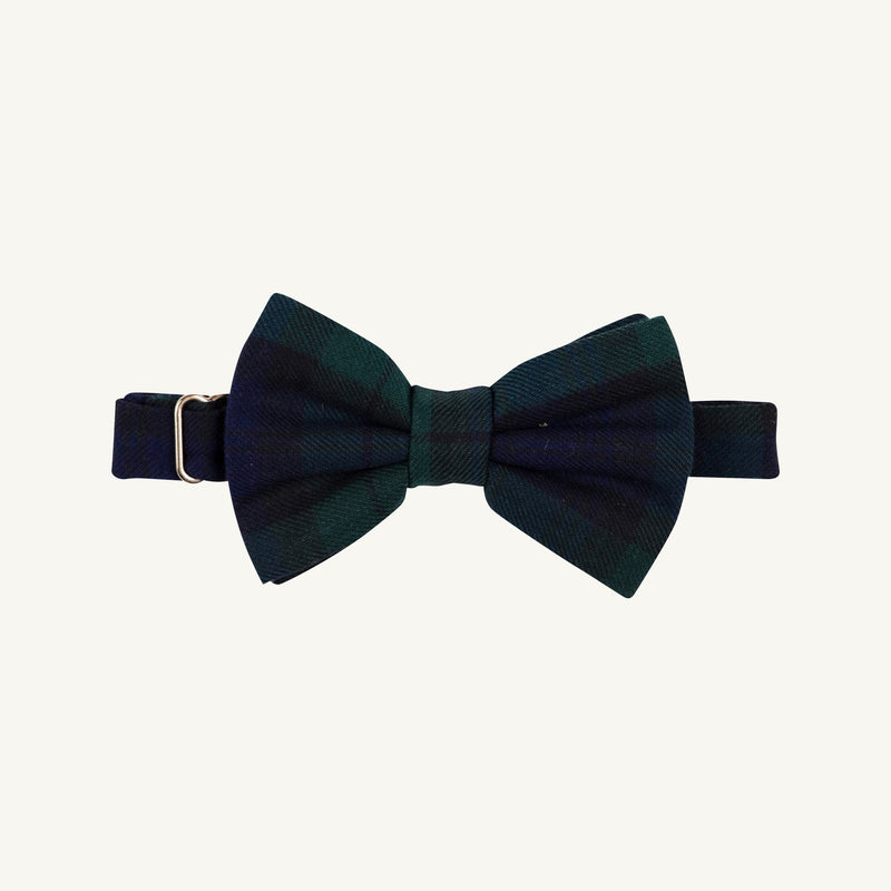 A Baylor Bowtie - Berwick Black Watch by The Beaufort Bonnet Company, featuring a dark green and navy plaid pattern with an adjustable strap and metal clasp, displayed on a plain light background.