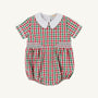 The Beaufort Bonnet Company’s Brentley Bubble in Richmond Red & Kiawah Kelly Green Gingham is a charming holiday baby romper featuring a festive red and green gingham pattern, short sleeves, a classic white Peter Pan collar, and smocked detailing at the waist—an adorable Christmas outfit for little ones.