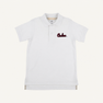 The South Carolina Prim & Proper Polo in Worth Avenue White by The Beaufort Bonnet Company is a white short-sleeve polo shirt featuring a collar, buttons, and an embroidered red South Carolina logo on the left chest. Crafted from soft Pima Cotton Knit, this polo offers a clean, classic look with its plain white background.
