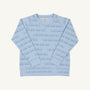The Cassidy Comfy Crewneck - Blue Choo Choos by The Beaufort Bonnet Company is a light blue children’s sweatshirt with long sleeves, decorated with an outlined blue choo choo pattern. Displayed flat on a white background, the front side and inner label of this comfortable crewneck are visible.
