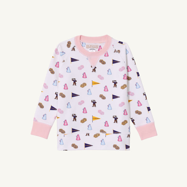Cheer on the Tenacious Tigers in style with The Beaufort Bonnet Company’s LSU Cassidy Comfy Crewneck, featuring playful prints of cheerleaders, pennants, megaphones, and pom-poms on a white background, accented by Palm Beach Pink cuffs, collar, and hem—perfect for showing your school spirit!.