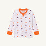 A long-sleeved child’s Clemson Cassidy Comfy Crewneck – Tiger Triumph with Clemson Orange by The Beaufort Bonnet Company, featuring orange cuffs and collar, white fabric, and a pattern of orange tiger paw prints and purple pennants.