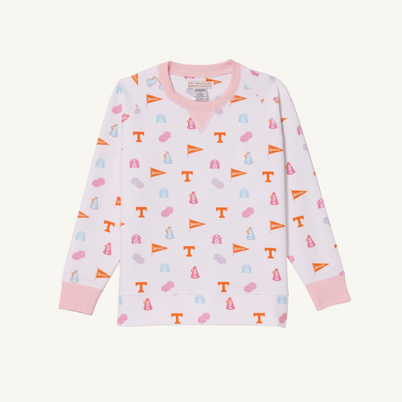 Show your school spirit in the Tennessee Cassidy Comfy Crewneck - Victory in Orange with Palm Beach Pink from The Beaufort Bonnet Company. This cozy pink and white long-sleeve shirt is adorned with cheerful orange T logos, festive pennants, light blue clouds, pink megaphones, and pom-poms throughout. Solid Palm Beach Pink accents at the collar, cuffs, and hem add a vibrant finish—perfect for celebrating victory in style!.