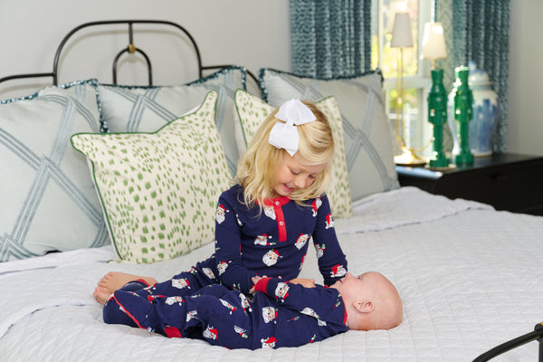  Model is wearing a size 6/12m.