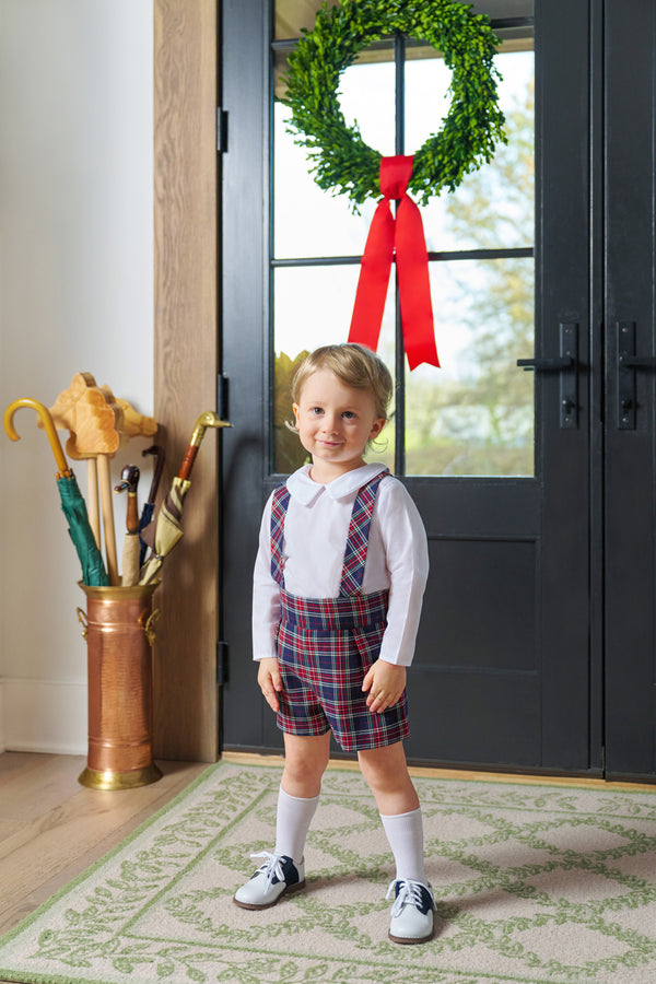  Model is wearing a size 2T.