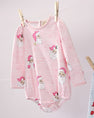 Long Sleeve Penny’s Play Bubble - Dear Santa (Palm Beach Pink Stripe) long-sleeve Pima cotton baby bubble romper with pink and white stripes and a repeating Santa Claus and snowflake pattern.