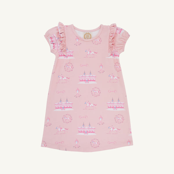 The Dorcie Day Dress - A Day at the Derby (Palm Beach Pink) by The Beaufort Bonnet Company is a pink short-sleeve girls’ spring dress with ruffled shoulders, showcasing a playful carousel horse and carnival print. The charming dress is laid flat against a white background.