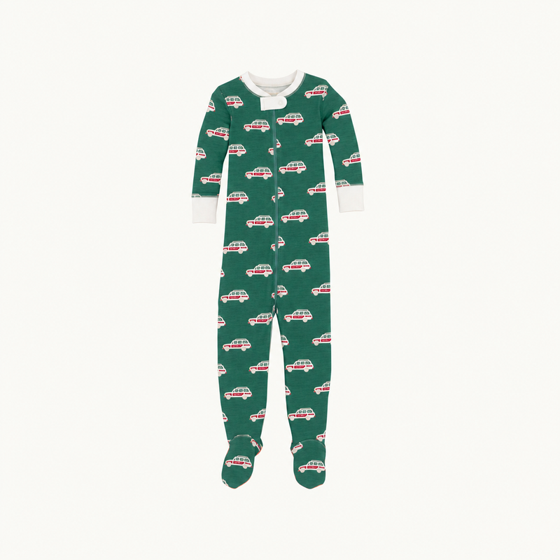Fallon Footie Pajamas - Windsor Wagon (Grier Green) with Palmetto Pearl in green cotton jersey knit featuring a repeating Christmas-themed pattern of small red and white station wagons, with white trim at the neck and cuffs.