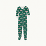 Fallon Footie Pajamas - Windsor Wagon (Grier Green) with Palmetto Pearl in green cotton jersey knit featuring a repeating Christmas-themed pattern of small red and white station wagons, with white trim at the neck and cuffs.