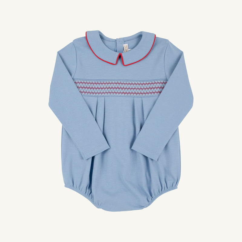 Long Sleeve Bradford Bubble - Barrington Blue with Richmond Red Smocking in pima cotton knit, featuring a Peter Pan collar with red piping and red and blue smocking across the chest.