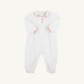 Long Sleeve Britt Romper - Worth Avenue White with Holly, a white Pima cotton baby romper featuring a Christmas-themed embroidered holly collar, red ric-rac trim, and two red buttons.