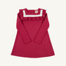 A children’s Long Sleeve Darla Dress by The Beaufort Bonnet Company, in the Begley Berry with Palmetto Pearl colorway, features an A-line silhouette with long sleeves, soft Pima Cotton Knit fabric, a white square neckline, and ruffle trim detail on the chest—shown laid flat on a light background and perfect for autumn.