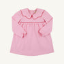 Introducing the Long Sleeve Maude’s Day Dress in Pier Party Pink with Richmond Red by The Beaufort Bonnet Company. Crafted from 100% Pima cotton, this classic baby dress features long sleeves, a red-trimmed scalloped collar, and gently gathered fabric at the chest. The simple design is finished with buttons at the back for easy dressing.