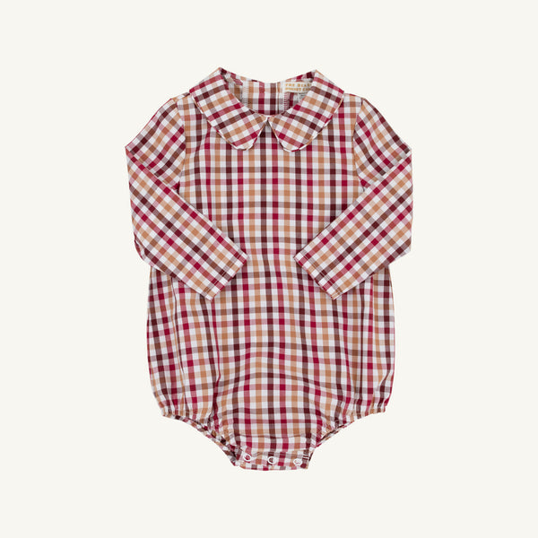 A long sleeve Peter Pan collar onesie in the classic Easton Pond Plaid from The Beaufort Bonnet Company, designed with convenient snap buttons at the bottom.