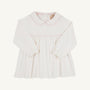 Maude’s A Line Top by The Beaufort Bonnet Company in Palmetto Pearl & Palm Beach Pink is a long-sleeve white baby top crafted from soft Pima cotton, featuring a Peter Pan collar with light pink trim on the collar and chest, gathered waist, back buttons, and elastic cuffs.