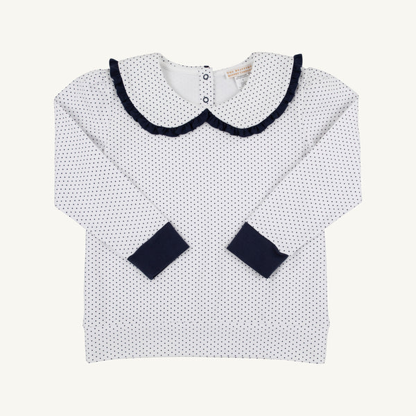 Sure! Here’s the rewritten sentence using the provided product data: The Beaufort Bonnet Company’s Maude’s Ruffle Cassidy Comfy Crewneck in Nantucket Navy Microdot with Worth Avenue White is neatly laid flat on a plain background, showcasing its long sleeves, large Peter Pan collar trimmed in black, black cuffs, and delicate microdot detailing throughout.