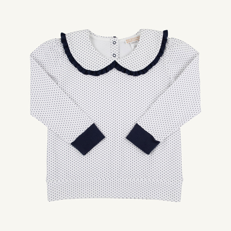 Sure! Here’s the rewritten sentence using the provided product data: The Beaufort Bonnet Company’s Maude’s Ruffle Cassidy Comfy Crewneck in Nantucket Navy Microdot with Worth Avenue White is neatly laid flat on a plain background, showcasing its long sleeves, large Peter Pan collar trimmed in black, black cuffs, and delicate microdot detailing throughout.