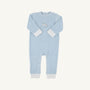 The Beaufort Bonnet Company’s Paxton Playsuit in Buckhead Blue features long sleeves, white cuffs and ankle bands, and an embroidered rocking horse on the chest. Designed for easy changing, it includes snap closures along the legs.