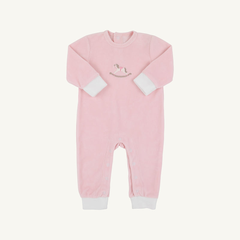 The Beaufort Bonnet Company’s Paxton Playsuit in Palm Beach Pink features crisp white cuffs, a charming rocking horse embroidery on the chest, and convenient leg snaps for easy changing.