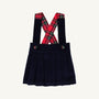 Pearl Prep Skirt in Society Prep Plaid featuring navy pleated fabric and crisscross Nantucket Navy corduroy suspender straps.