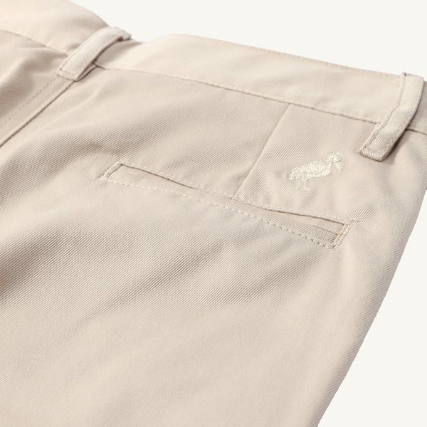 Prep School Pants in Keeneland Khaki with a small stork embroidery above the back pocket in a classic boys’ style.