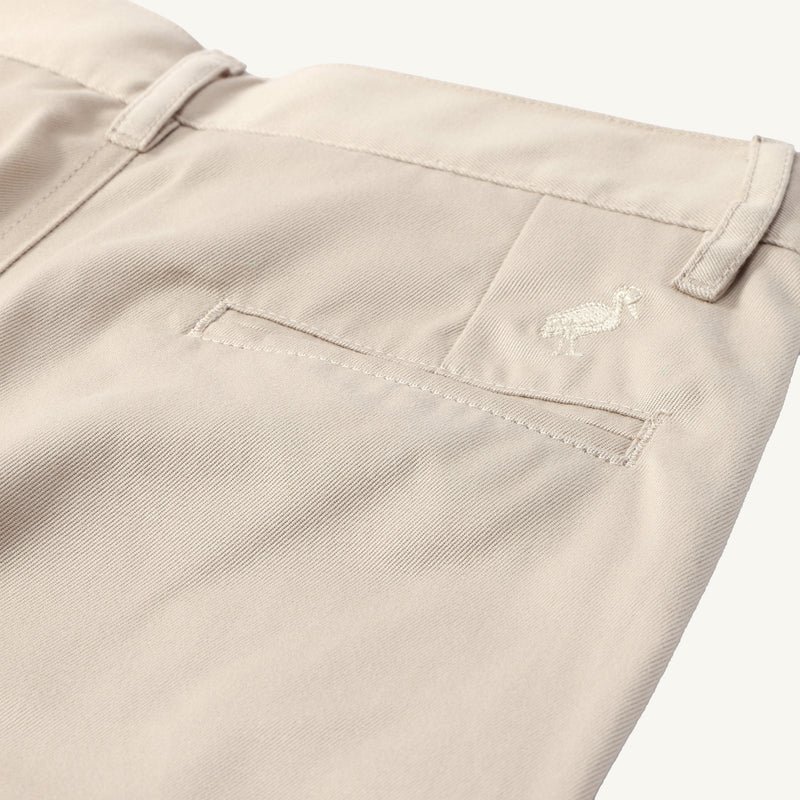 Prep School Pants in Keeneland Khaki with a small stork embroidery above the back pocket in a classic boys’ style.