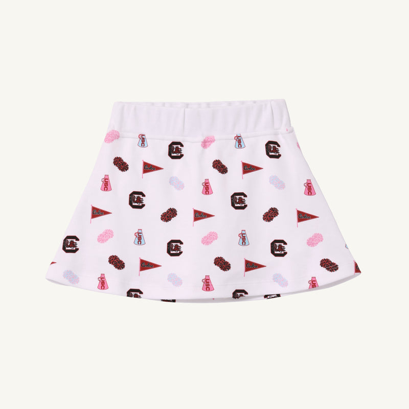 Show your South Carolina pride with The Beaufort Bonnet Company’s USC Searcy Skort - South Carolina Spirit with Worth Avenue White. This comfortable Pima Cotton skort features a white background adorned with maroon and pink university-themed icons, including pennants, foam fingers, and letter C logos, perfectly capturing true Gamecock spirit.
