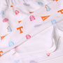 Show your spirit on gameday with The Beaufort Bonnet Company’s Tennessee Searcy Skort – Victory in Orange with Worth Avenue White. This vibrant skort features white fabric adorned with orange, pink, and blue cheerleader-themed prints—complete with pom-poms, megaphones, a dog mascot, and letter T logos—celebrating the University of Tennessee and its tradition of Victory in Orange.