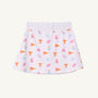 The Tennessee Searcy Skort - Victory in Orange with Worth Avenue White by The Beaufort Bonnet Company features a white background adorned with orange, blue, and pink University of Tennessee-themed icons—including T logos, pennants, pom-poms, and megaphones—making it the perfect choice for your next gameday outfit.