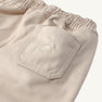 Sheffield Pants in Keeneland Khaki, crafted in cotton twill with an elastic waistband and a back pocket featuring an embroidered stork.
