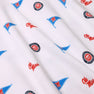 Crafted from white Pima cotton, the Ole Miss Short Sleeve Patton Play Bubble - Gawsh Almighty with Nantucket Navy by The Beaufort Bonnet Company features a repeating design of blue pennants, red “Ole Miss” text, and round University of Mississippi logos in red and white across the fabric.