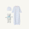 Introducing Sir Proper’s Sweet Arrival (Beale Street Blue) Bundle by The Beaufort Bonnet Company—an adorable everyday set featuring a white layette gown adorned with blue animal prints, a matching hat, and the cuddly Bradley Bear with a blue ribbon. The perfect baby shower gift!.