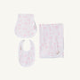 Introducing Sir Proper’s Sweet Arrival (Hamptons Hot Pink) Accessories Bundle by The Beaufort Bonnet Company—a delightful set featuring a Baby Buggy Blanket with a ruffled edge, an Oopsie Daisy Burp Cloth, and a Burp Me Bib. Each item is crafted in crisp white adorned with light pink Hamptons Hot Pink patterns. Beautifully arranged on a plain white background, this charming trio makes the perfect baby shower gift.