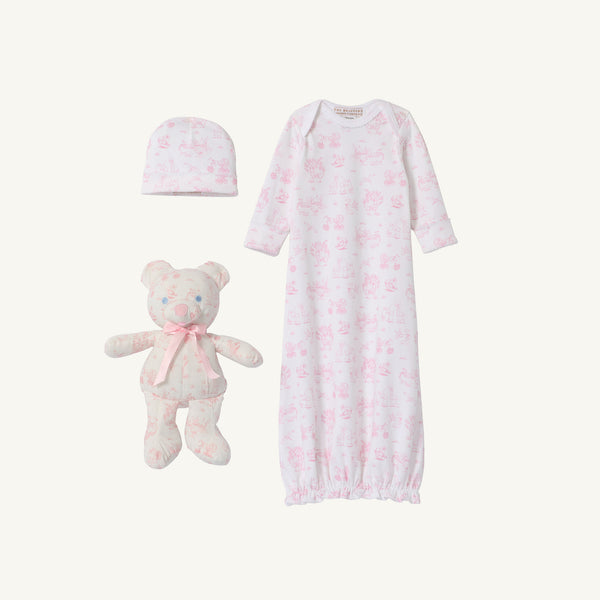 Introducing Sir Proper’s Sweet Arrival (Hamptons Hot Pink) Bundle by The Beaufort Bonnet Company—a delightful newborn set featuring a Pima cotton layette, including a baby gown, matching hat, and the cuddly Bradley Bear. This charming ensemble comes in crisp white with light pink animal prints and is beautifully presented on a plain white background—making it an ideal baby shower gift.