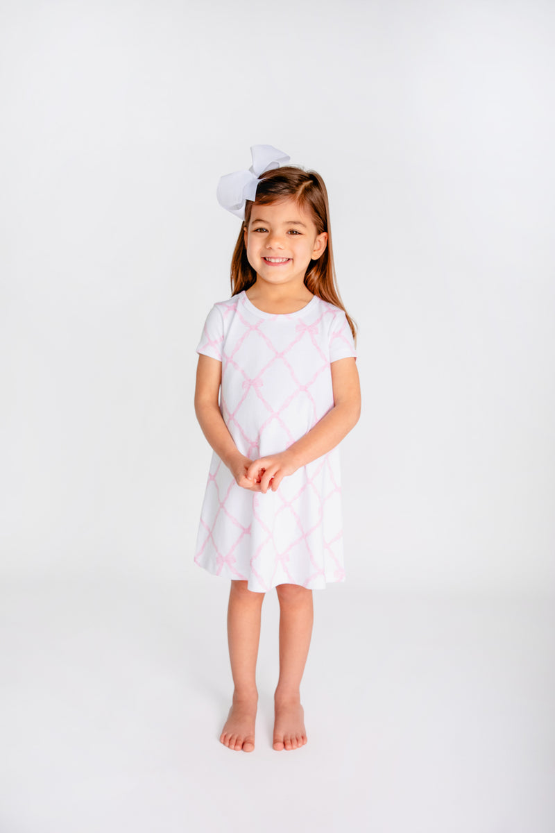 pink dress with white bow Cecil - 1950s Lace this dress adds a flirty touch to any formal occasion TBBC Girls' Polly Play Dress