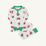 Sutton’s Sweet Dream Set – Serious Santa Business by The Beaufort Bonnet Company is a children’s white Pima cotton pajama set featuring green cuffs and collar, adorned with playful illustrations of Santa Claus in various poses. This festive holiday sleepwear includes a long-sleeve top and matching long pants, shown flat on a light background—perfect Christmas pajamas for kids.