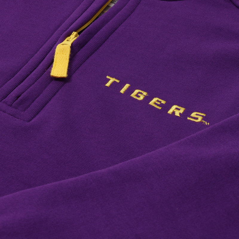 A close-up of The Beaufort Bonnet Company’s LSU Hayword Half-Zip in LSU Purple with LSU Gold, featuring a yellow zipper and TIGERS embroidered in yellow letters on the chest—perfect for game day wear.