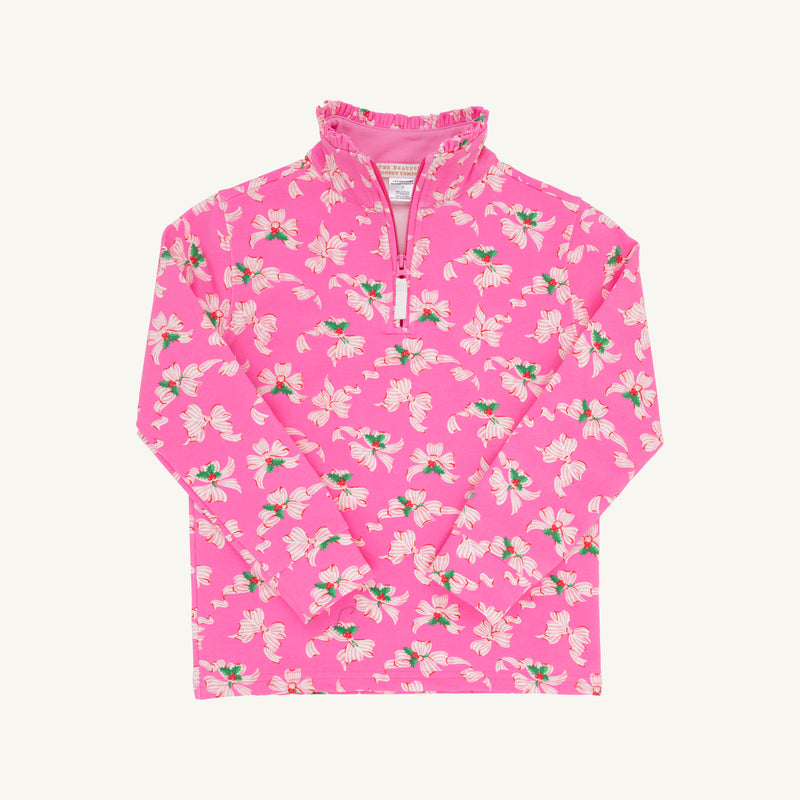 A long-sleeve, pink Canter Collar Half Zip - Bows of Holly pullover by The Beaufort Bonnet Company, featuring a ruffled collar and adorned with a white and red floral print in soft Cotton French Terry.