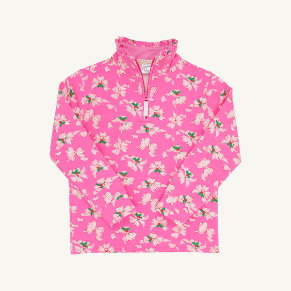 A long-sleeve, pink Canter Collar Half Zip - Bows of Holly pullover by The Beaufort Bonnet Company, featuring a ruffled collar and adorned with a white and red floral print in soft Cotton French Terry.
